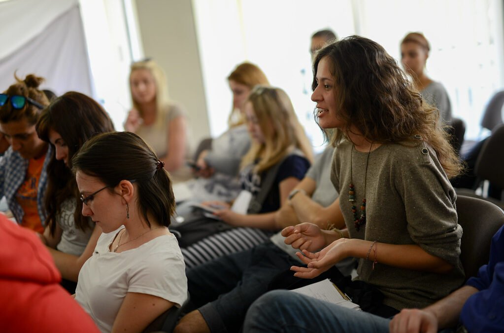 How can a community turn its users into brand advocates?